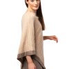 Rundhalsad Jennie poncho ljusbeige beige flätad